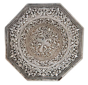 A small repousse work silver dish, Kandy, Sri Lanka, late 19th century, of octagonal form, with...