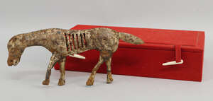 
	
		A Chinese metal model of a horse, possibly from Ordos, Mongolia, in an antique manner,...