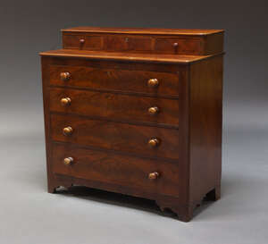 
	
		A Victorian mahogany chest of drawers, the top having superstructure with three short...
