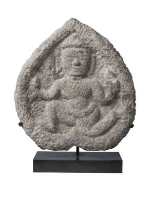 
	
		A South East Asian stone stele, 10th century, carved with a male deity, 26cm x 23cm

	

