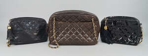 
	
		A Chanel brown quilted lambskin shoulder bag, double leather and gilt metal chains with...