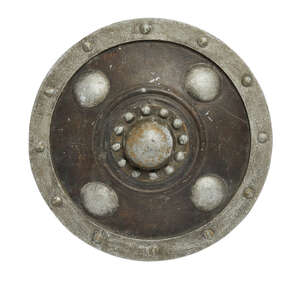 
	
		Willow, 1988, a circular cast aluminium prop shield, with large central boss with beaded...