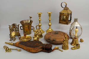 
	
		A bronze mortar and pestle, 18th century, together with a collection of brass and copper,...