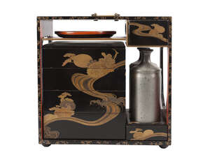 
	
		A Japanese lacquer travelling food case, early 20th century, the exterior decorated with...