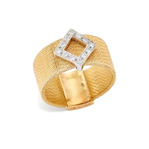 A diamond set ring, composed of an open lozenge shaped plaque, set with brilliant-cut diamonds,...
