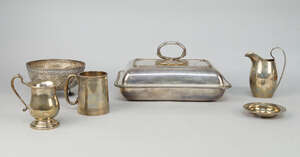 
	
		A silver cream jug, Birmingham c.1924, Ellis Jacob Greenberg, together with a silver...