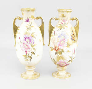 
	
		A pair of Royal Bonn pottery vases, with twin handles on pedestal bases, decorated with...