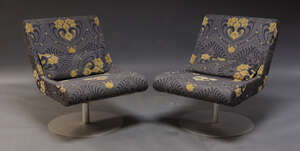
	
		A pair of Boomerang IXC edition Swivel chairs by Cassina IXC, Japan, c.2003, upholstered...