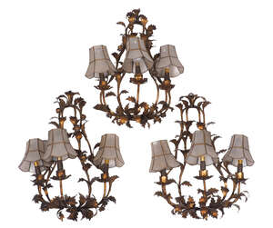 
	
		A set of three gilt metal three-branch foliate wall lights, early 20th century, 49cm high...