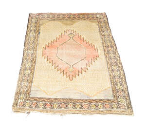 
	
		A Hamadan rug, with brick red pole medallion in camel coloured trellis pattern field,...