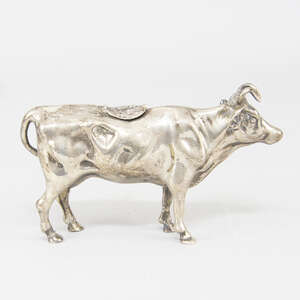 
	
		A late 19th century Hanau silver cow creamer, import marks for London c.1892, David...