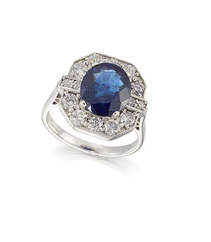 
	
		An 18ct gold sapphire and  diamond ring octagonal cluster ring, the claw-set oval-cut...