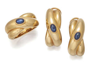 
	
		Cartier, a pair of sapphire earrings and ring, each of crossover design accented with a...