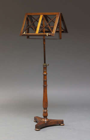 
	
		A Victorian mahogany duet stand, with opposing adjustable sheet rests, on adjustable pole...