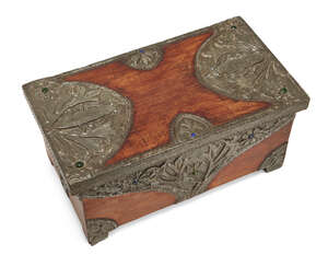 
	
		Manner of Alfred Daguet (1875-1942), 
		 
		Wooden casket encased in metalwork...