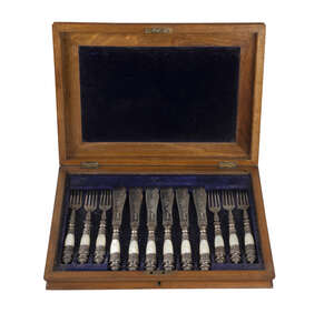 A cased set of six pairs Victorian silver and mother of pearl fish eaters, Sheffield c.1870, Martin, Hall & Co (Richard Martin & Ebenezer Hall), with scroll en
