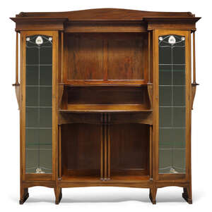 
	
		Liberty & Co (British), a Mahogany Display cabinet 
		c.1905, stamped on lock plates...