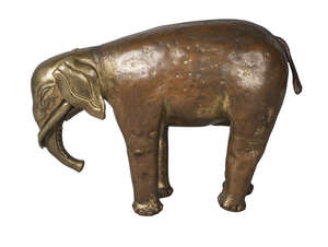 
	
		A Tibetan gilt copper alloy figure of an elephant, 19th century, standing four square,...