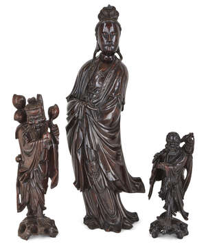 
	
		Three Chinese carved wood figures, 19th century, with one large hardwood figure of a...