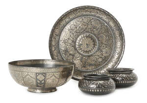A bidri dish, bowl and two small vessels,India, 19th century, 
the dish with central flower...