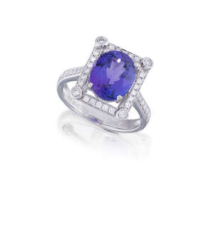 
	
		A tanzanite and diamond ring, the oval tanzanite, weighing approximately 4.36 carats, in...
