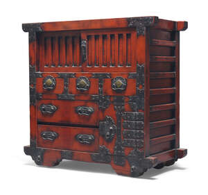 
	
		A Korean wood metal mounted side cabinet, early 20th century, the front with pair of...