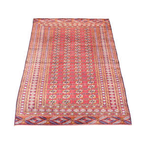 
	
		A Tekke rug, c.1910, the claret coloured field with four rows of guls, enclosed by...