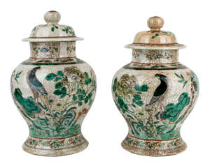 
	
		A pair of Chinese famille verte jars and covers, late 19th century, enamelled in mirror...