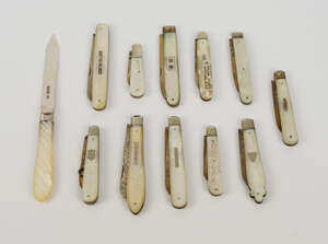 
	
		A silver fruit knife, Sheffield c.1920, Hanry Atkins, with gadrooned mother of pearl...