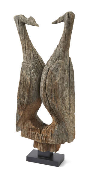 
	
		A Madagascan funerary post finial, carved as a tall stylised bird, on modern stand, 73cm...