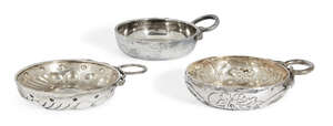 
	
		A group of three French silver wine tasters comprising a 20th century example with...