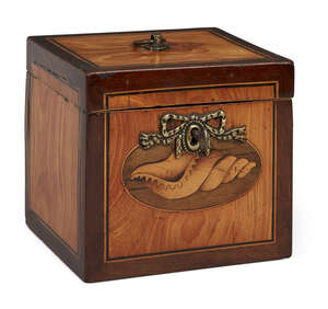 
	
		A George III satinwood cube-shape tea caddy, the loop handle and bow lock plate within...