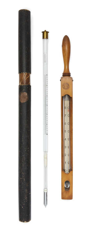 
	
		Two Continental thermometers comprising: a Danish fruitwood portable example by F.C....