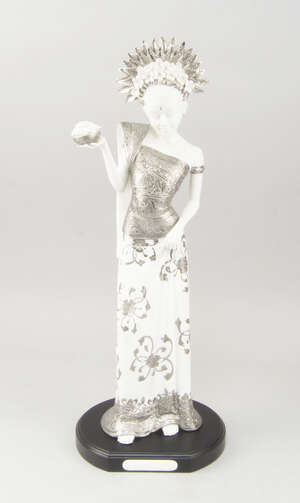 
	
		A tall porcelain figure of a Balinese lady, of recent manufacture, by Kharisma Porselen,...