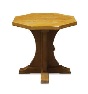 Robert Thompson (1876-1955), a Mouseman English oak occasional table with octagonal top
		c.1970, signed with a carved mouse on one support
		The adzed octag