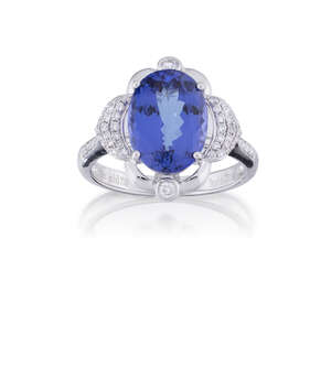 
	
		A tanzanite and diamond ring, the oval tanzanite, weighing approximately 4.93 carats,...