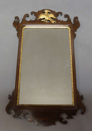 
	
		A George III style mahogany and parcel gilt fretwork mirror, second half 20th Century,...