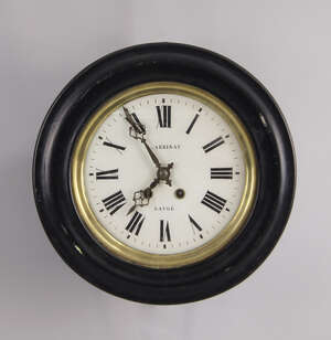 
	
		A French circular wall clock, late 19th century, with an ebonised case, the white painted...
