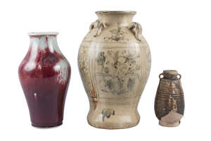 Three pieces of Chinese pottery, Song, Ming, and Qing dynasty, comprising a large jar painted in underglaze blue with floral motifs, with four lug handles to s