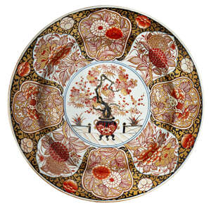 
	
		A fine and impressive Japanese porcelain large Imari charger, circa 1700, painted in the...