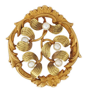 
	
		A late 19th early 20th century gold and seed pearl 'mistletoe' brooch, the seed pearl...
