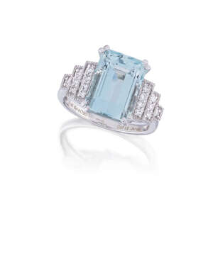 
	
		An aquamarine and diamond ring, the cut-cornered rectangular aquamarine, weighing...