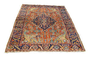 
	
		A Heriz carpet, early to mid 20th century, with indigo medallion and all over foliate...