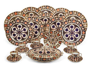 
	
		A Royal Crown Derby part dinner service, 20th Century, decorated in the Imari pattern no....