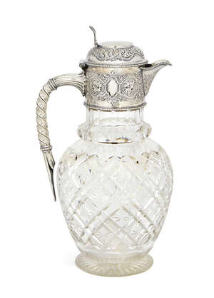 A Victorian silver and cut glass claret jug, Sheffield c.1889, W & G Sissons (William & George Sissons) retailed by Manoah Rhodes & Son, Bradford, with chased 