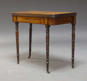 
	
		A William IV Mahogany and line strung tea table, the fold over top with reeded edge,...