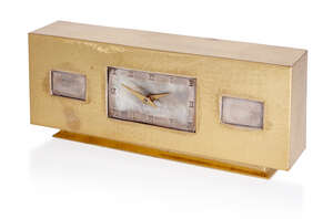 
	
		Designer Unknown, 
		 
		Bauhaus style mantel clock, circa 1930s, 
		Silvered metal...