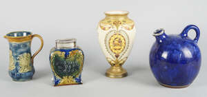 A Group of Doulton wares comprising: a Doulton Lambeth stoneware Honest Tea tea caddy with...