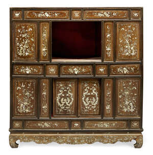 
	
		A Chinese mother of pearl inlaid cabinet, 19th century, with arrangement of drawers and...