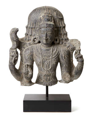 
	
		A black stone sculpture of Shiva, India, 19th century in a 10th century style, carved...